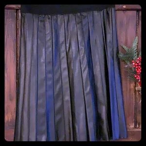 Pleated, black leather skirt